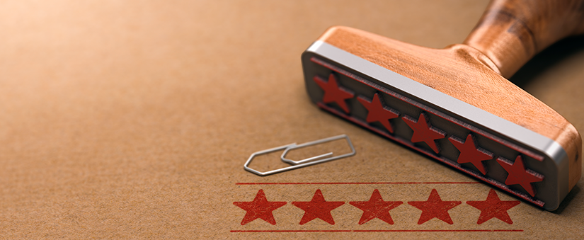 Gestão de vendas: carimbo com cinco estrelas vermelhas