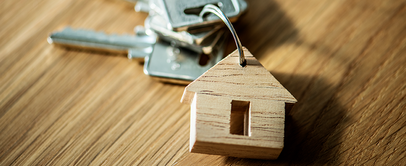 Valorização de imóveis - Chave de imóvel com chaveiro de casa