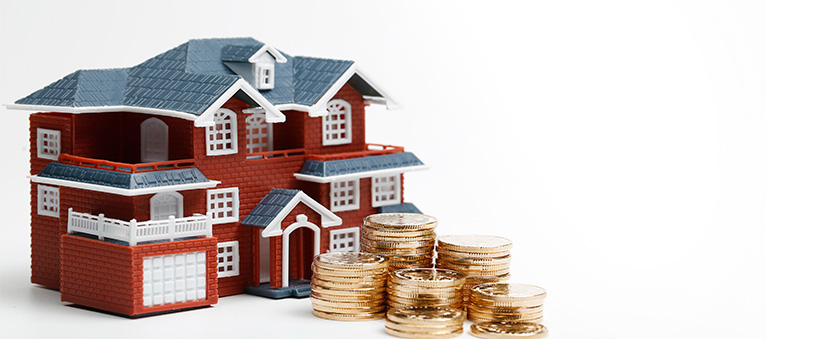 pagadoria pagadoria: miniatura de uma casa ao lado de moedas empilhadas.