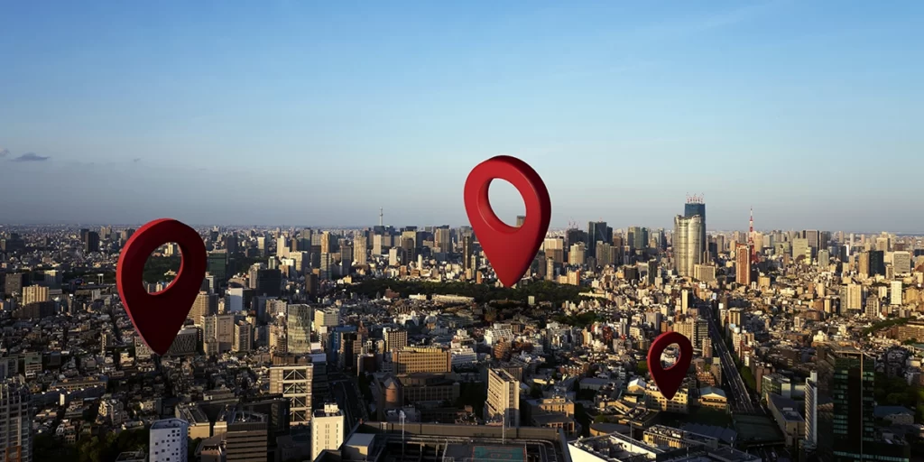 Google localização Google localização: imagem de uma cidade vista de cima. Em destaque alguns ícones de localização.