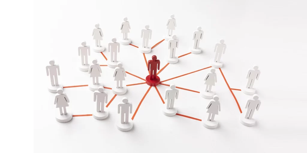 Marketing para construtoras Marketing para construtoras: imagem de vários bonecos interligados por fios vermelhos. Um deles, ao meio, está em destaque na cor vermelho.