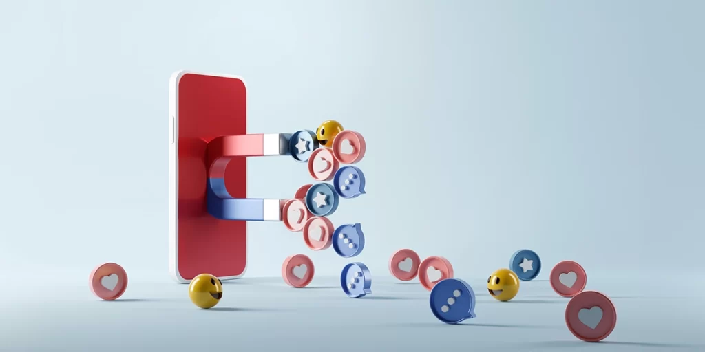 Captação de clientes no mercado imobiliário Captação de clientes no mercado imobiliário: ilustração de um celular e um grande imã saindo da tela. O ímã está atraindo vários ícones de balões, corações e emojis felizes.