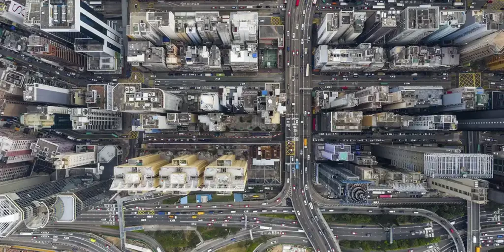 Infraestrutura Urbana Infraestrutura Urbana: imagem vista de cima de uma cidade com muitos prédios.