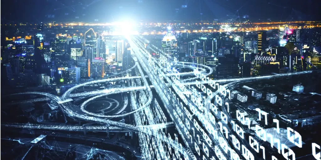 Growth Marketing Growth Marketing: imagem aérea de uma cidade a noite bastante iluminada.