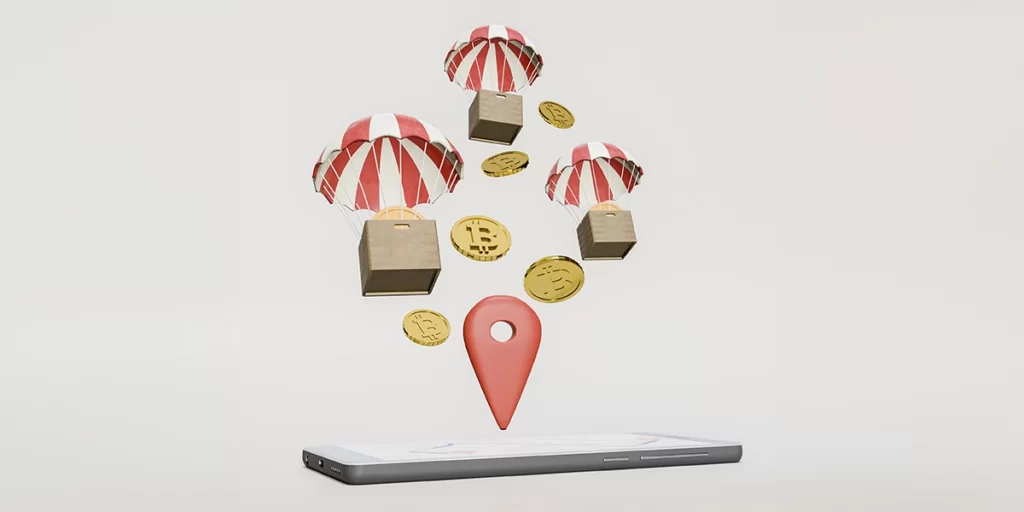 Conversão de Leads Conversão de Leads: imagem de fundo branco, com um celular no cento. Da tela do celular sai um ícone de localização. Acima algumas caixas presas por paraquedas.