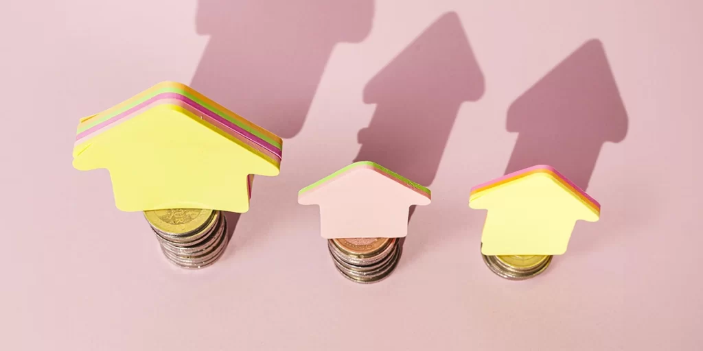 O que é um lead qualificado O que é um lead qualificado: A imagem mostra três pontos de ação (sticky notes) de cor laranja, cada um com uma sombra correspondente. Cada sticky note está sobre um pilão de moedas, sugerindo uma representação visual de dinheiro ou valor. A sticky note à esquerda tem uma sombra mais estreita e mais baixa, enquanto a sticky note à direita tem uma sombra mais larga e mais alta. A sticky note do meio tem uma sombra intermédia em termos de comprimento e altura. A imagem pode ser uma representação simbólica de investimento, economia ou valor monetário.