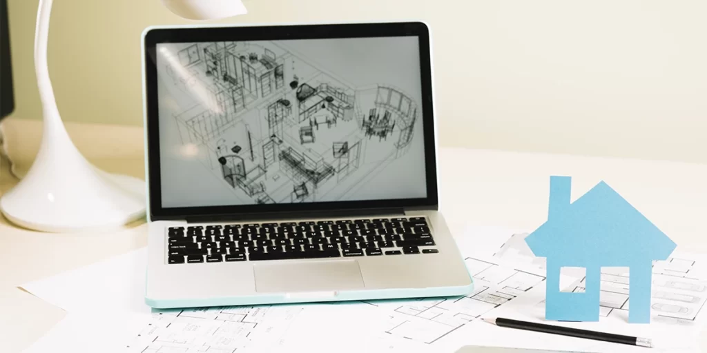 CRM para imobiliária CRM para imobiliária: A imagem mostra um ambiente de trabalho com uma laptop aberta em cima de uma mesa. A tela da laptop exibe um desenho de um plano de uma casa, que parece ser um projeto arquitetônico. Ao lado da laptop, há um material que parece ser um modelo de uma casa, possivelmente feito de papel ou cartão, com cores claras. Há também um material que parece ser um plano de construção ou um esboço de projeto arquitetônico, com linhas e marcas que representam as diferentes áreas da casa. A mesa é iluminada por uma lâmpada moderna com um cabo curto, e há outros itens no ambiente, como um caneta preto e um par de óculos de sol. O ambiente sugere que alguém está trabalhando em um projeto de arquitetura ou design de interiores.